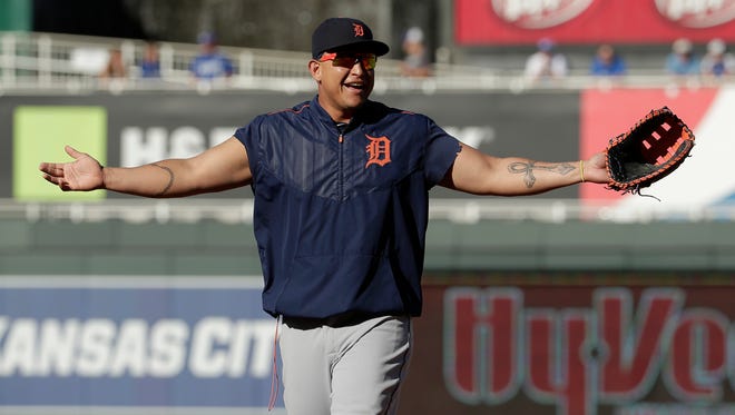 Detroit Tigers' Miguel Cabrera gestures to a teammate before the  game.