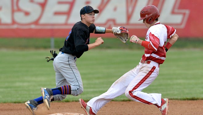 Jeffersonville's Drew Campbell, right, steals second base ahead of the relay throw to Silver Creek's Bryson McNay during their game Wednesday, May 20, 2015, at Jeffersonville High School. (Photo by Timothy D. Easley/Special to the C-J)