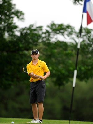 Blanket's Luke Kinkade chips on to the 14th green during the first round of the Class 1A boys UIL  State Golf Tournament on Monday, May 22, 2017, at Lions Municipal Golf Course in Austin. Kinkade shot a 79 on the round and is in sixth place, Blanket is in fifth place.