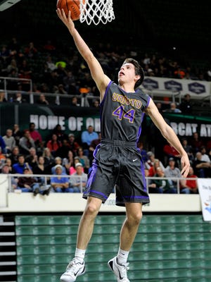 Unioto's Nick Corcoran shoots a layup during the game against Walnut Ridge High School during the Division II boys regional semifinal game at Ohio University’s Convocation Center Thursday. The final score was Unioto 45, Walnut Ridge 46.