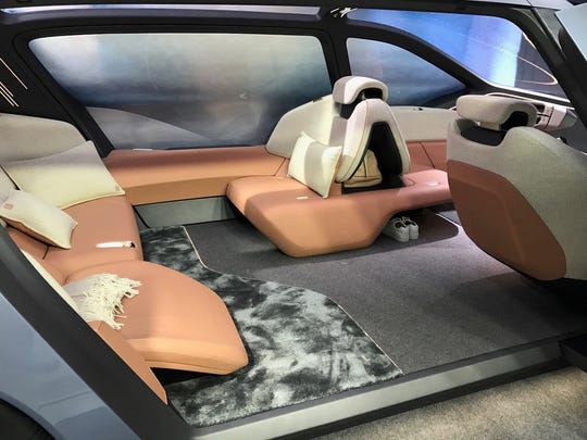 This Electric Luxury Car Lets You Snooze While It Zooms