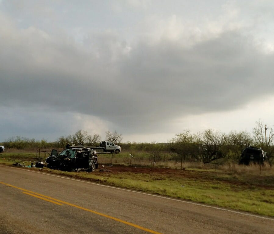 Texas Department of Public Safety troopers investigate a two-vehicle crash that left several storm chasers dead Tuesday , March 28, 2017, near Spur, Texas. Tornadoes had been reported nearby at the time of the crash and heavy rain had been reported i