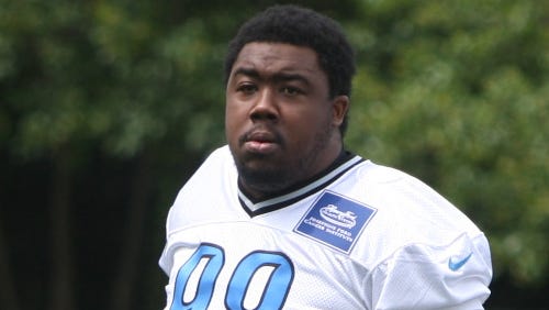 Detroit Lions defensive tackle Nick Fairley takes the field July 28, 2014, in Allen Park.