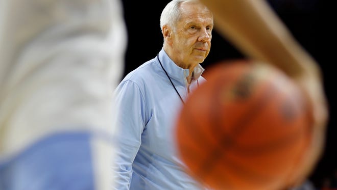 North Carolina head coach Roy Williams watches college basketball practice, Thursday, March 24, 2016, in Philadelphia. North Carolina plays against Indiana in a regional semifinal game in the NCAA Tournament on Friday. (AP Photo/Chris Szagola)