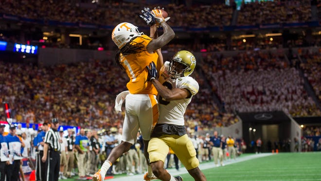 Tennessee wide receiver Marquez Callaway (1) makes a catch to score a touchdown during the Chick-fil-A Kickoff Game at the Mercedes-Benz Stadium in Atlanta on Monday, Sept. 4, 2017. 