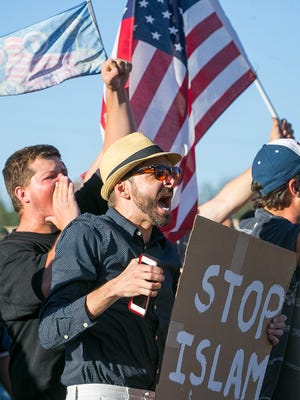 Anti-Islam protesters gather outside a mosque May 29, 2015, in Phoenix.