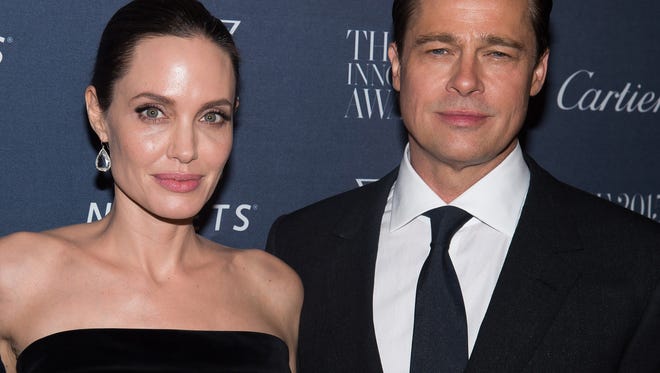 In this Nov. 4, 2015 file photo Angelina Jolie Pitt and Brad Pitt attend the WSJ Magazine Innovator Awards 2015 at The Museum of Modern Art in New York. Jolie has filed for divorce from Pitt, bringing an end to one of the world’s most star-studded, tabloid-generating romances.