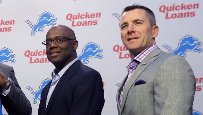 Detroit Lions general manager Martin Mayhew, left, and team president Tom Lewand pose for a photo May 1, 2015, in Allen Park.