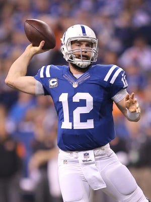 Indianapolis Colts quarterback Andrew Luck (12) drops back to pass in the second half of their game. The Indianapolis Colts host the Cincinnati Bengals in the AFC Wild Card game Sunday, January 4, 2015, afternoon at Lucas Oil Stadium. 