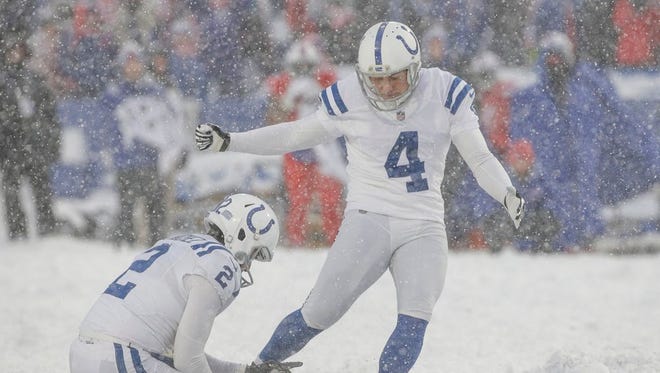 Indianapolis kicker Adam Vinatieri connects on a game-tying extra point against Buffalo late in the fourth quarter on Sunday.
 Matt Kryger/IndyStar
Indianapolis Colts kicker Adam Vinatieri (4) kicks a game-tying extra point against the Buffalo Bills late in the fourth quarter at New Era Field in Orchard Park, N.Y., on Sunday, Dec. 10, 2017.