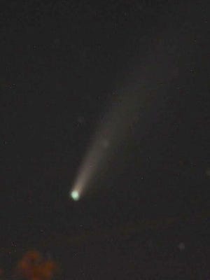 Lecia Engle, who read the last Looking Up column online from the Columbus Dispatch, sent this picture she took of Comet NEOWISE on July 17 from Madison County, Ohio.