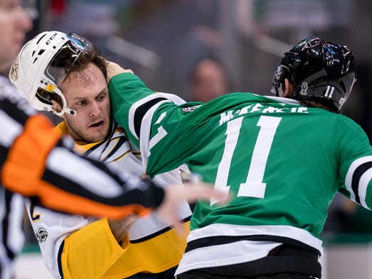 Dec. 5: Dallas Stars forward Curtis McKenzie (11) fights