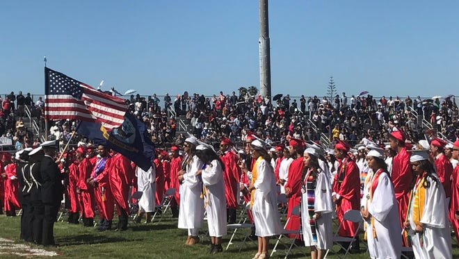 Hueneme High School students prepare for graduate Friday. The school graduated 446 students, which is around 100 more than last year, according to school administrators.
