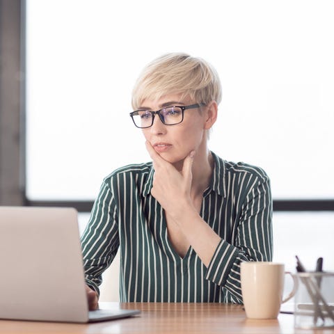 A person at a laptop.