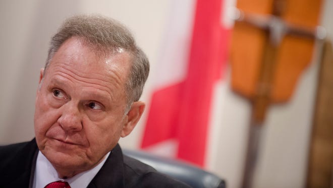 Alabama Chief Justice Roy Moore talks about his order discouraging probate judges from issuing same sex marriage licenses before the Alabama Supreme Court makes a ruling on how the 2015 Supreme Court ruling on Same Sex marriage affects the Alabama Marriage Protection Act on Wednesday, Jan. 6, 2015, at the Alabama Supreme Court building in Montgomery, Ala.