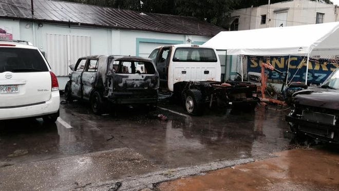 Two vehicles were damaged by a fire set at Suncars Auto Corp. located 4558 Palm Beach Blvd. The fires were set around 2 a.m. Monday. The fire was the third reported within an hour Monday.