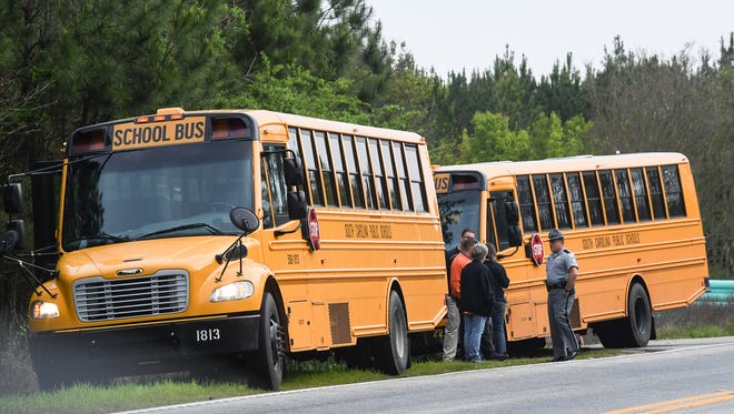 Two school buses bumped on State Highway 187 at Boscobel Road near Pendleton High School on Tuesday morning. Students were taken off the buses and school officials stood with troopers at the scene collecting information about the incident. 