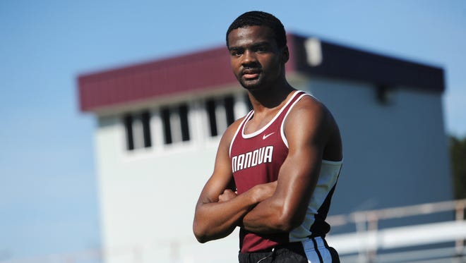 Nandua's Michael Sutton poses for a portrait during track practice in front of the press box on Wednesday, March 16, 2016. Sutton is a senior on the school's track team with a 3.76 grade point average. He is hoping to run track at the University of Maryland Eastern Shore next year.