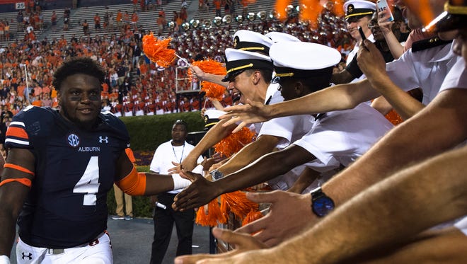 Auburn linebacker Jeff Holland (4) celebrates with fans after the game during the NCAA football game between Auburn vs. Georgia Southern on Saturday, Sept. 2, 2017, at Jordan Hare Stadium in Auburn, Ala. Auburn defeated Georgia Southern 41-7/ 
