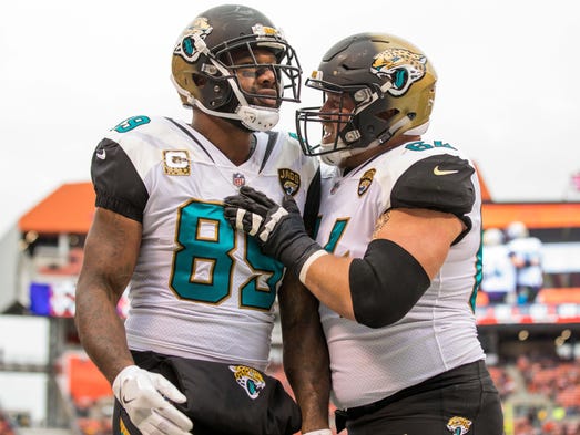 Jacksonville Jaguars offensive guard Chris Reed congratulates