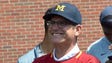 Michigan coach Jim Harbaugh, sporting an AS Roma shirt,