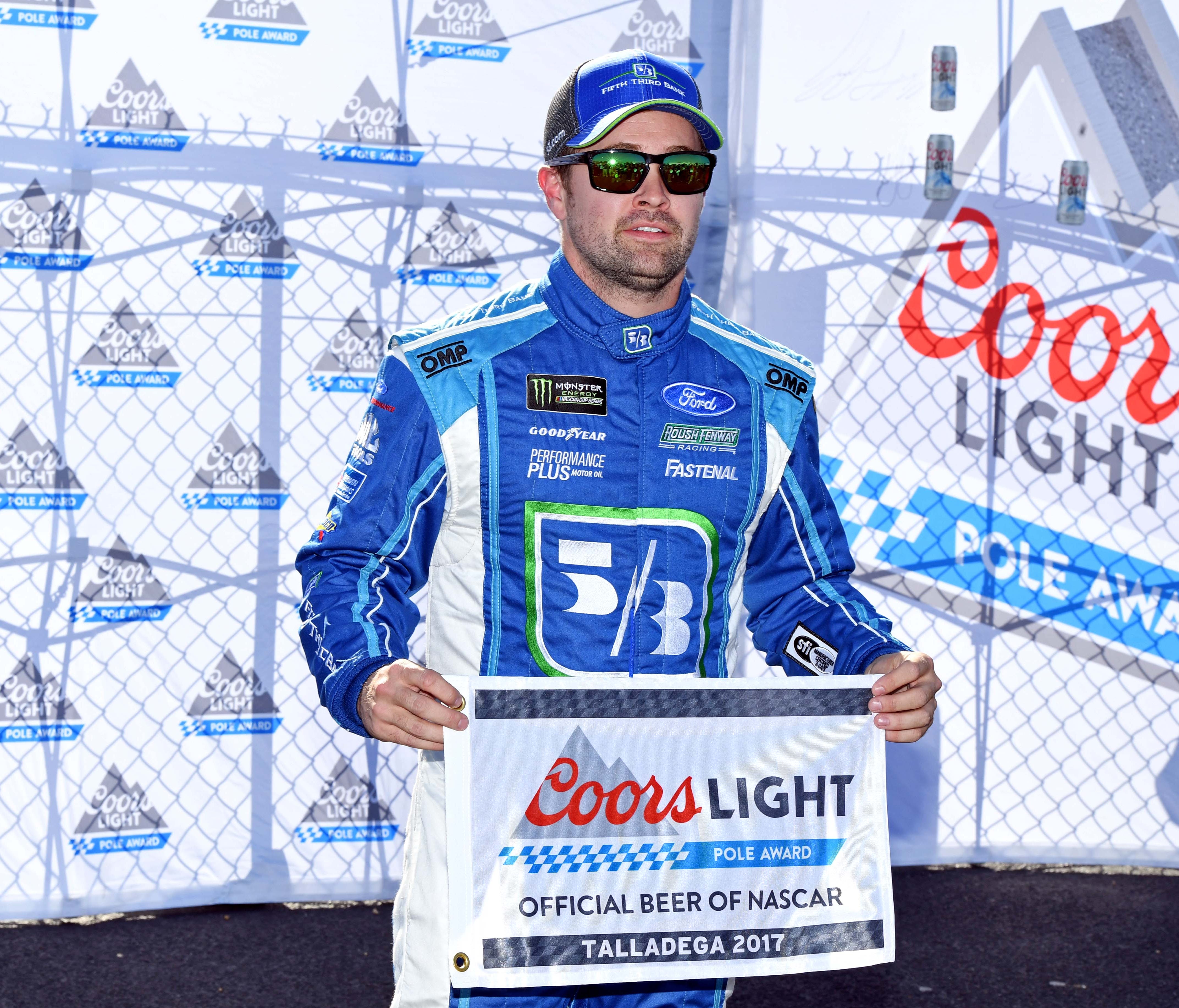 Ricky Stenhouse Jr. celebrates after winning the pole for the GEICO 500 at Talladega Superspeedway.