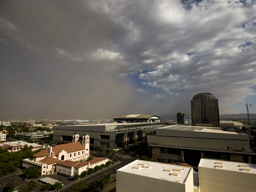 The first dust storm of the season passes through downtown
