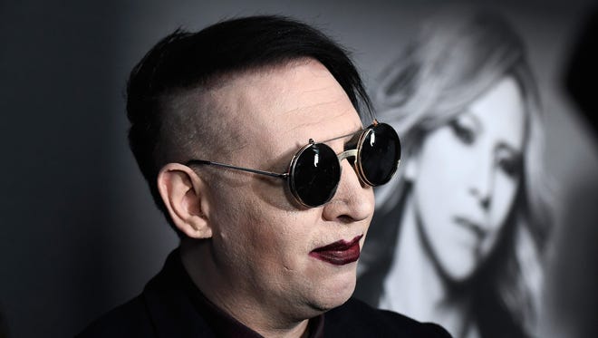 Marilyn Manson is expected to turn himself in to the LAPD on arrest warrants based in New Hampshire.