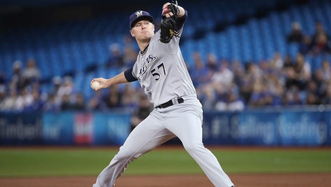Chase Anderson delivers a pitch in the first inning against the Blue Jays.