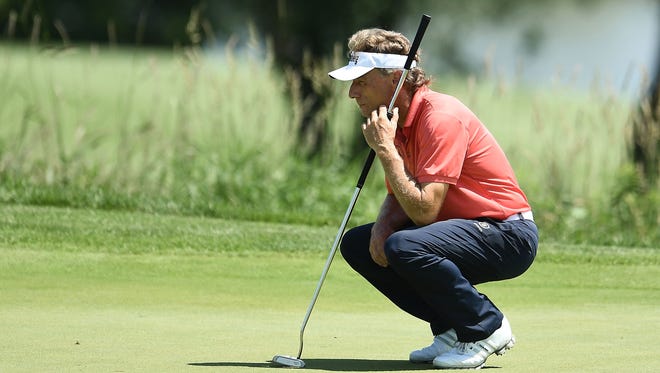 Bernhard Langer lines up a putt on the sixth green during the second round of the American Family Insurance Championship.