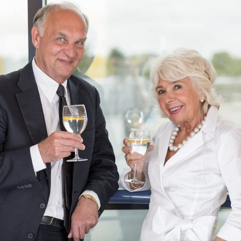 Well-dressed senior couple.