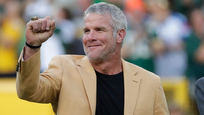 Brett Favre, shown showing off his Hall of Fame ring at Lambeau Field in 2016, is doing a half-hour interview each Monday morning during the Packers season on WKTI-FM (94.5).