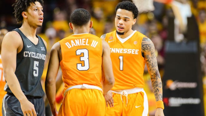Vols guard Lamonte Turner (1) celebrates with guard James Daniel III (3) during the second half of Saturday's game.