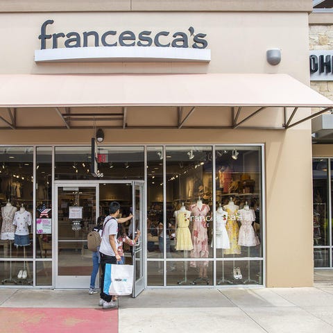 Customers walk into Francesca&#8217;s at Round Roc