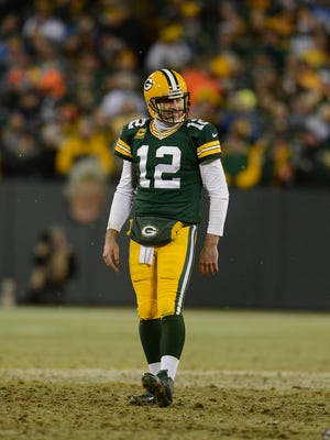 Green Bay Packers quarterback Aaron Rodgers reacts in the fourth quarter during Sunday's game against the Detroit Lions at Lambeau Field.
