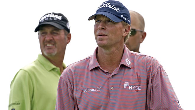 Steve Stricker  and Jerry Kelly look toward the seventh green during a practice round for the 2010 PGA Championship at Whistling Straits.