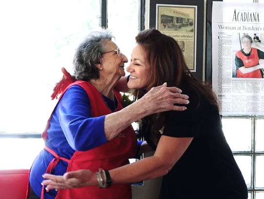 Ella Meaux gets a hug from owner Kackie Lerille at