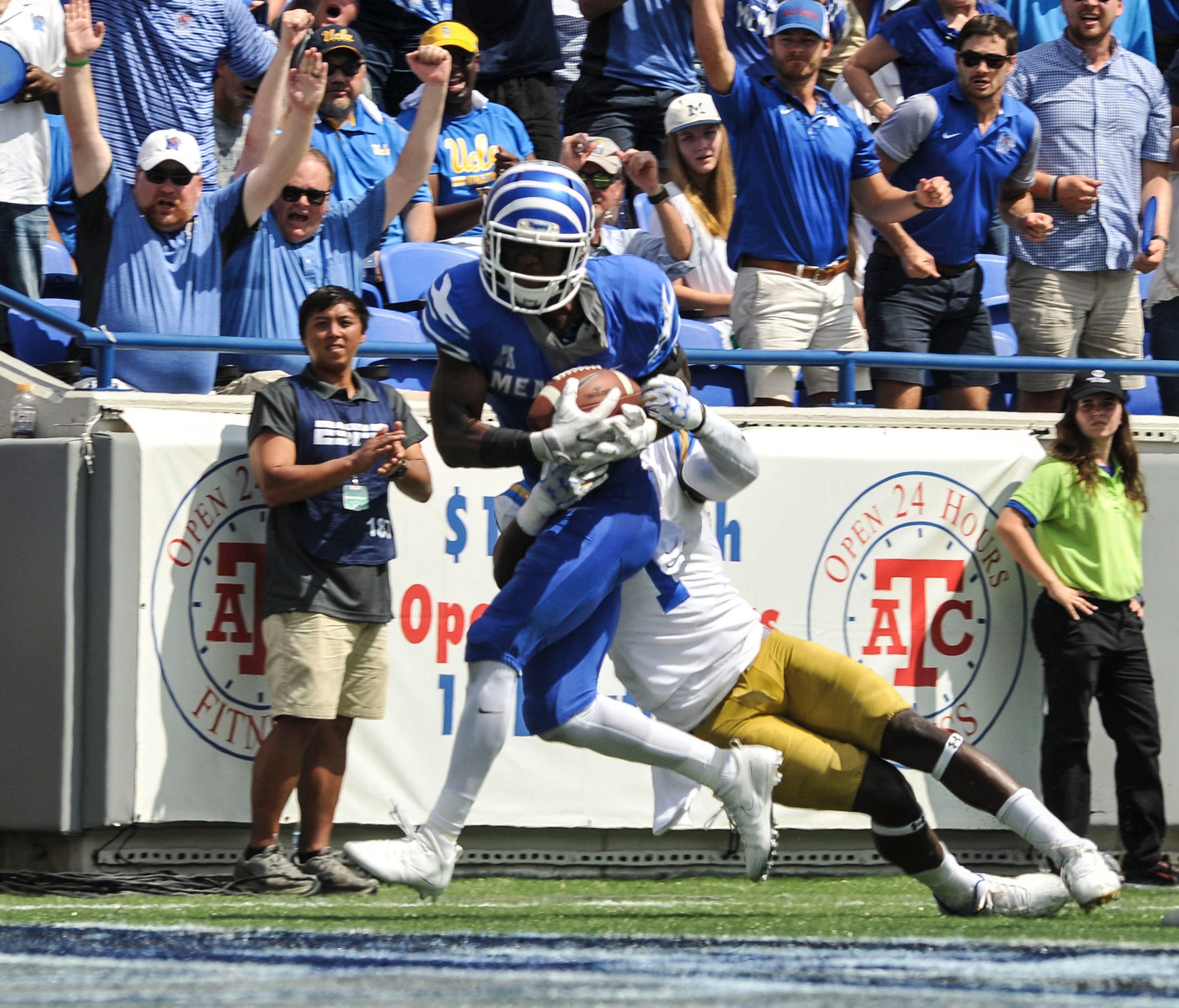 Memphis Tigers wide receiver Anthony Miller scores a touchdown against UCLA.