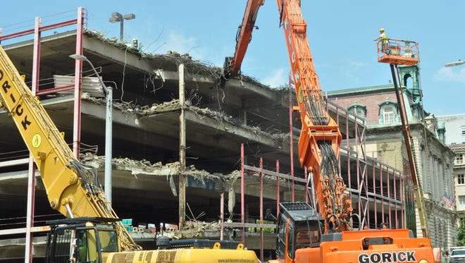 Demolition of the Collier Street parking ramp in downtown Binghamton began Monday.