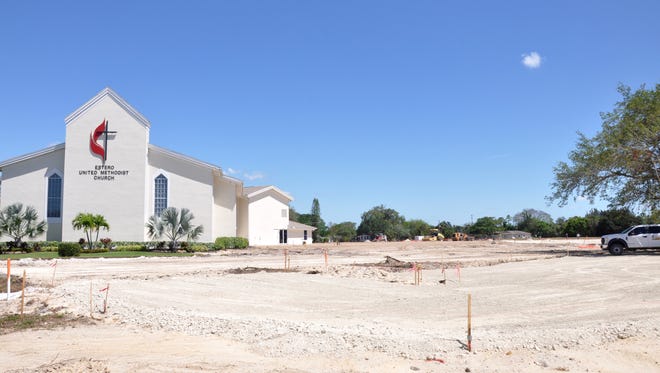 Parking areas formerly surrounding the Estero United Methodist Church building have been dug up, along with the undeveloped land south of the building in preparation for construction of an addition to the main building.