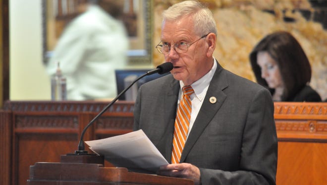 Rep. Frank Hoffmann, R-West Monroe, pushes his House Bill 531 through the House Monday. It would buckle down tobacco use on school property. Hoffmann, an ex-smoker and former school principal, hopes the proposed law will encourage people to stop smoking.