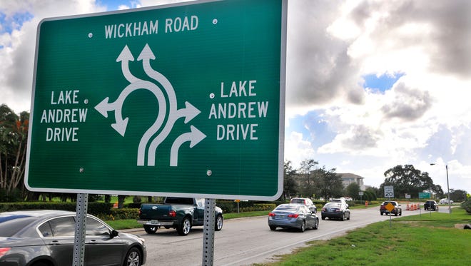 Westbound motorists approach the Viera roundabout at Wickham Road and Lake Andrew Drive.