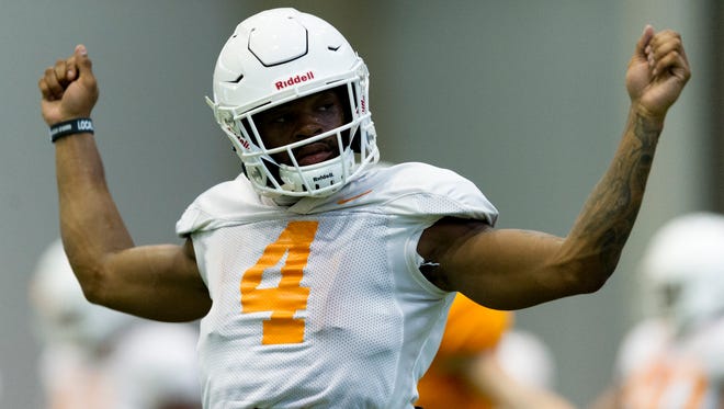 Tennessee's running back John Kelly (4) stretches during Tennessee fall football practice at Anderson Training Facility in Knoxville, Tennessee on Friday, August 4, 2017.