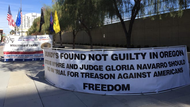 Banners outside the U.S. District Court building in Las Vegas on Nov. 8, 2017, show support for Cliven Bundy and his cause.
