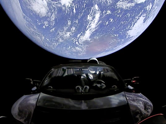 Картинки по запросу elon musk Last pic of Starman in Roadster enroute to Mars orbit and then the Asteroid Belt