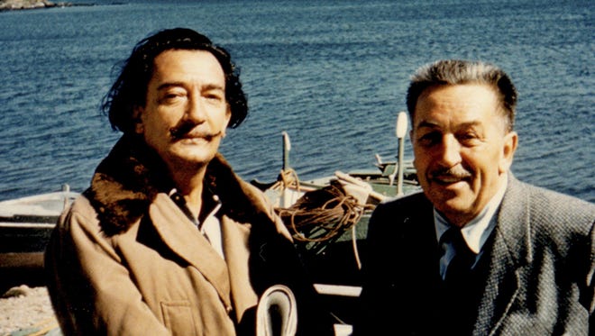 Surrealistic artist Salvador Dali, left, and Walt Disney at a beach in Spain in 1957.