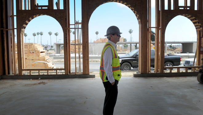 Michael Sondermann, manager of Sondermann Ring Partners LLC, checks out construction at Portside Ventura Harbor.
