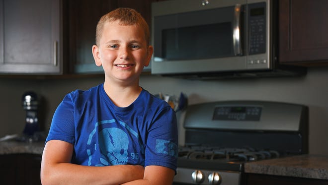 Joshua Weissenberger, 11, poses for a portrait Thursday, June 9, 2016, at his home in Sioux Falls. Weissenberger is South Dakota's winner for the 2016 Healthy Lunchtime Challenge, and will travel to Washington, D.C,. for the Kids' State Dinner.