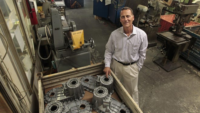 Len Morrell on the shop floor at his company, Morrell Manufacturing & Development Inc., in Rochester.