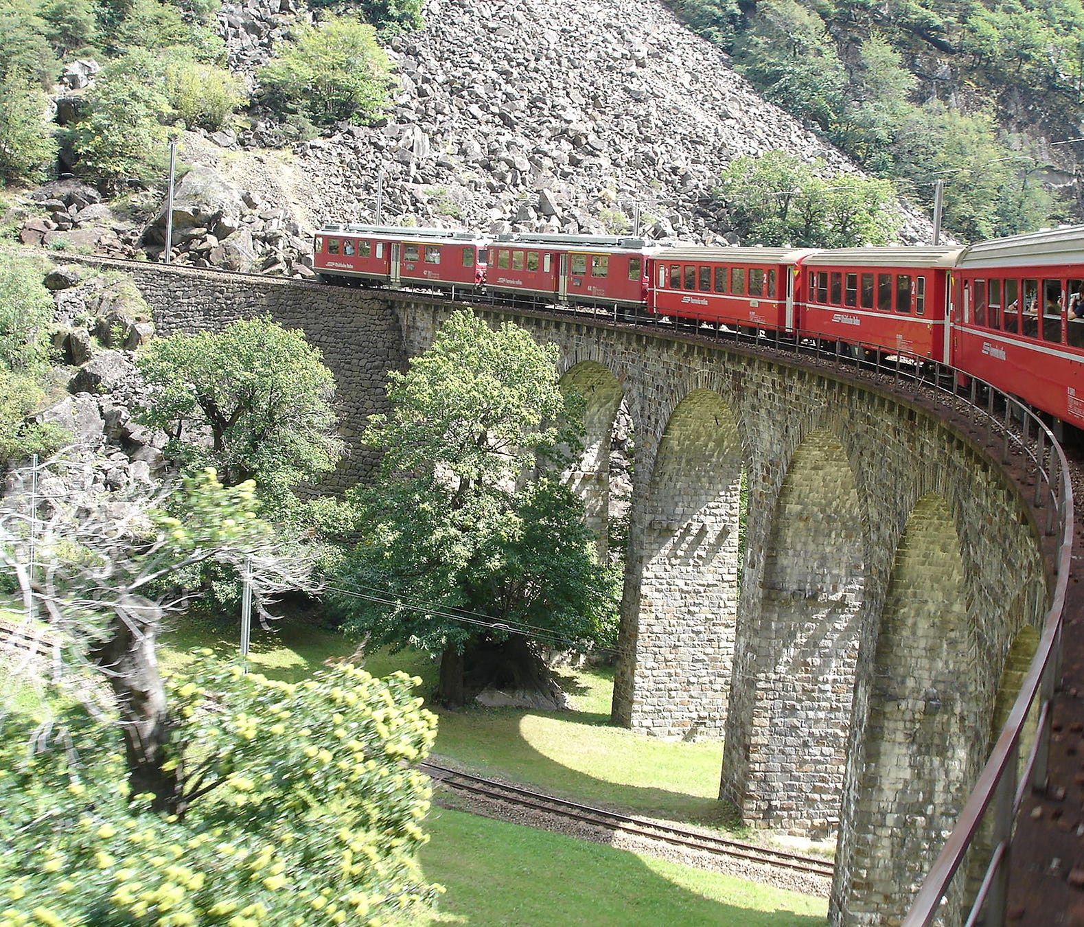 Taking a train like Switzerland's Bernina Express keeps you close to Europe's charms.